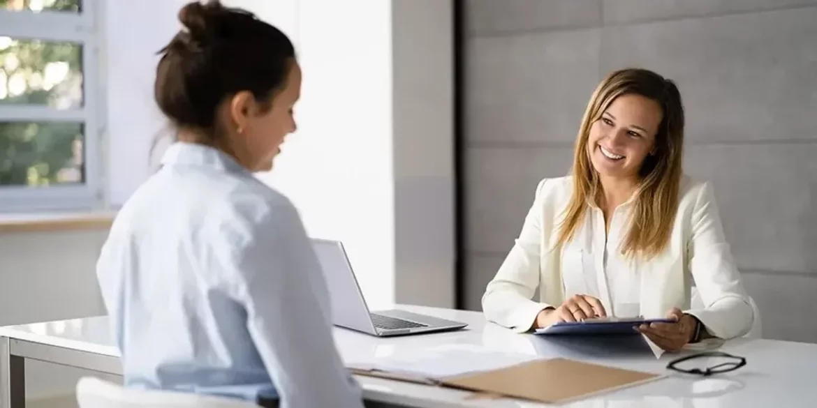 two women talking coach mentor