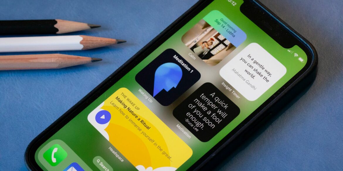 a-phone-on-a-desk-displaying-widgets-from-wellness-apps.jpg