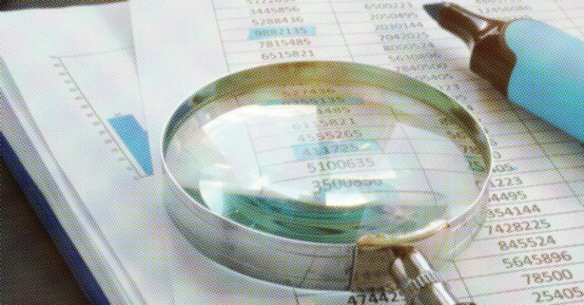 magnifying-glass-and-highlighter-on-stack-of-paper.jpg